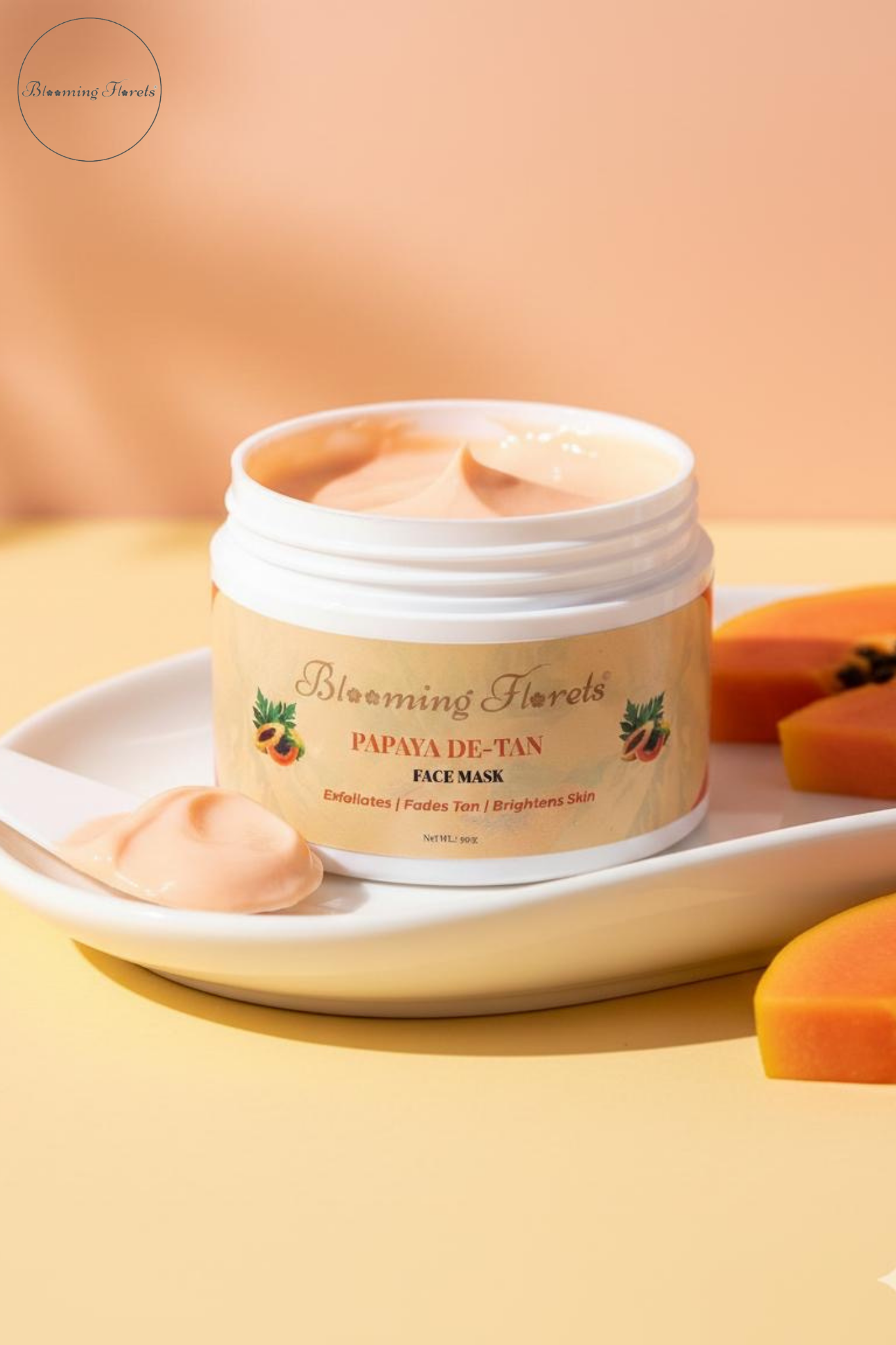 BloomingFlorets Papaya De-Tan Face Mask – Natural Glow & Tan Removal BloomingFlorets Papaya De-Tan Face Mask in a jar with creamy texture, designed to remove tan and brighten skin naturally.